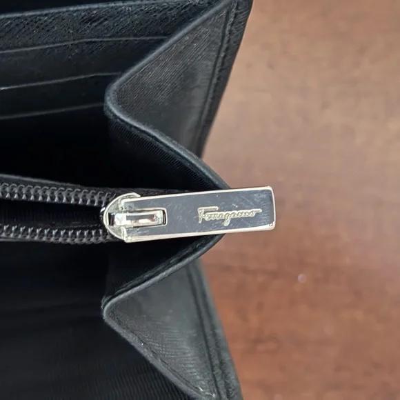 Salvatore Ferragamo black long snap wallet.
Excellent condition. - Picture 9 of 9